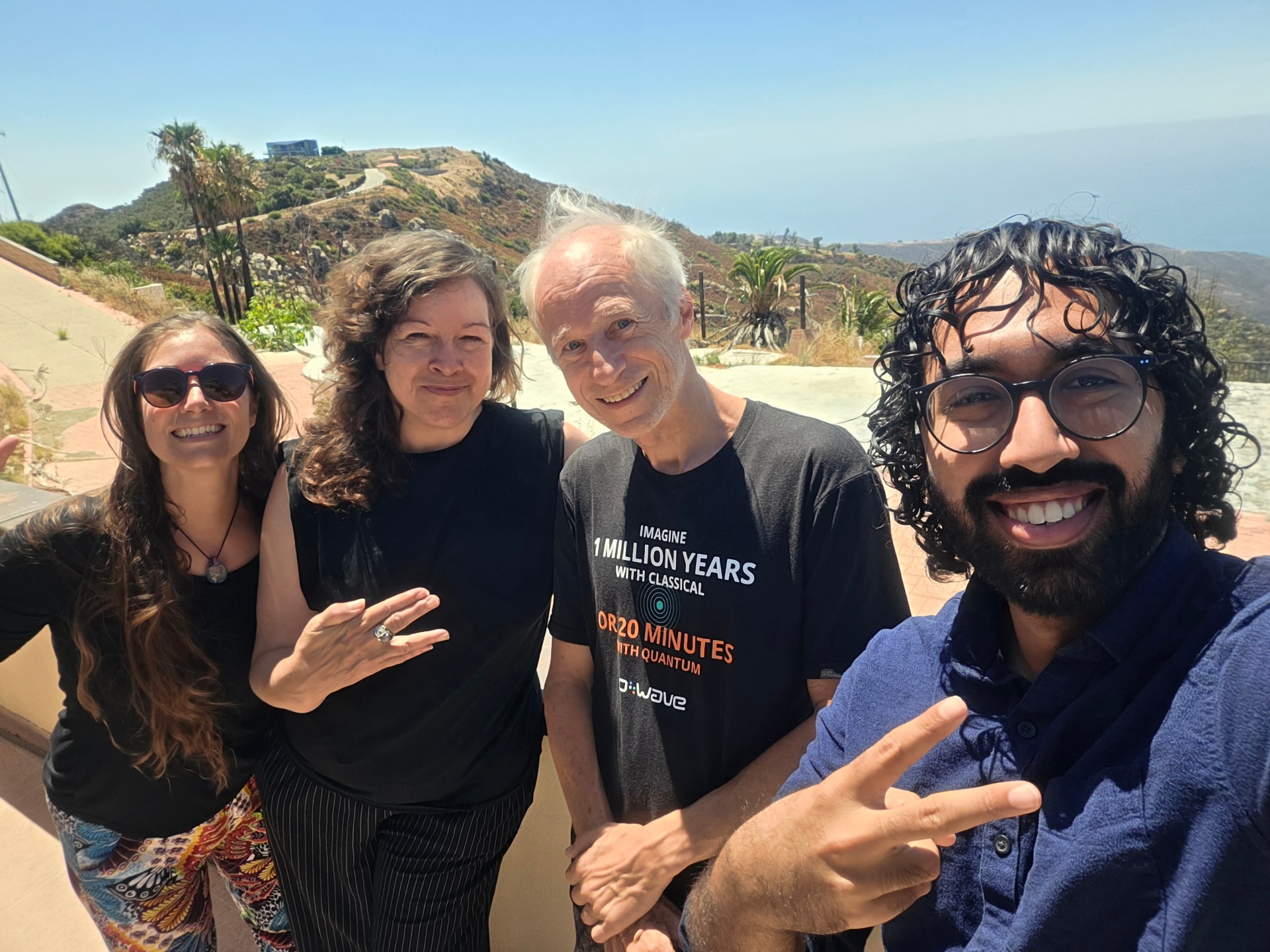 The Phoenix crew — Josette Seitz, Evo Heyning, Ray Aschheim, and Amir Mohideen Basheer Khan — on the hillside above the Los Angeles capture site